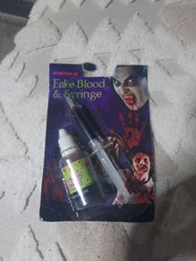 fake blood and syringe