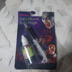 fake blood and syringe