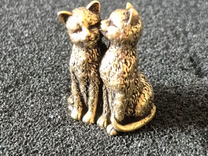 3 brass cats,. Solid brass.