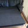 Black leather two-seater sofa-bed Image 2