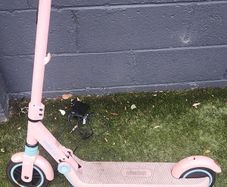 pink ninebot escooter with charger