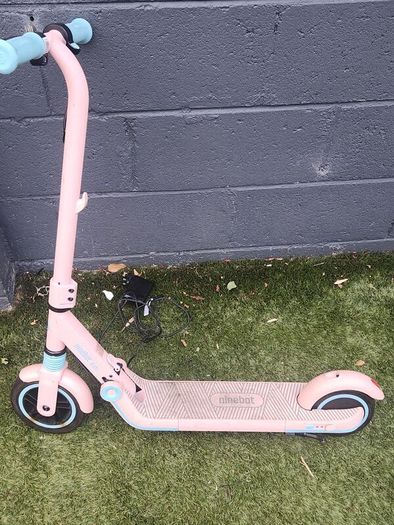 pink ninebot escooter with charger