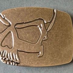Belt buckle, skull design.