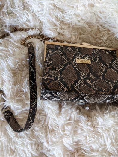 Handbag by Carlos Santana
