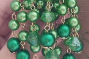 Vintage brooch - a cluster of emerald-green beads.