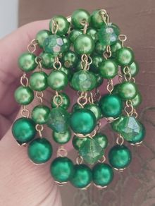 Vintage brooch - a cluster of emerald-green beads.