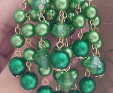 Vintage brooch - a cluster of emerald-green beads.