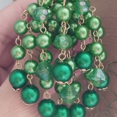 Vintage brooch - a cluster of emerald-green beads.