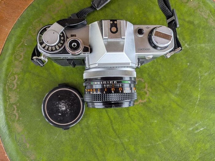 Canon AE-1 + FD 50mm f/1.8 + Tokina 28mm f/2.8