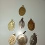 Small St Francis of Assisi religious medal with Italian blessing on the back plus other religious medals Image 2