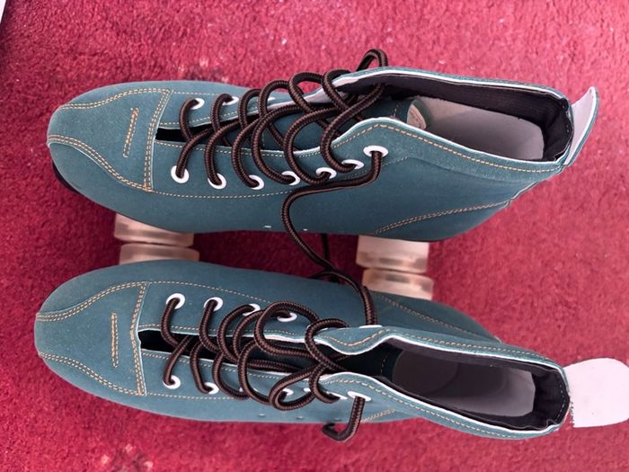Teal suede roller skates