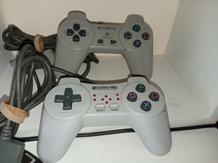 2 x Playstation 1 Ps1 controllers one official and one competition pro with turbo both working