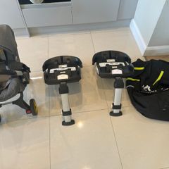 Doona with two isofix bases and a travel bag