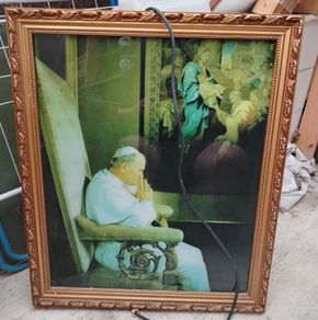 Pope framed photo with light