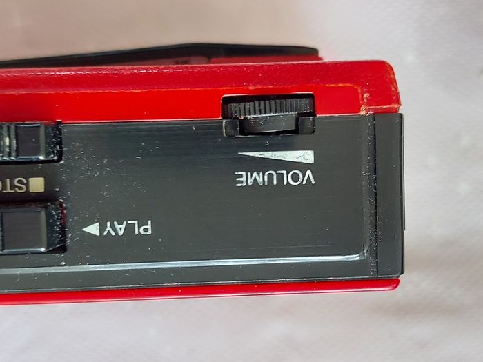 Sony Walkman and Sanyo AM-FM Stereo cassette Player, excellent cosmetic condition, no cables or batteries