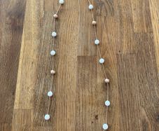 Guess 3 piece rose gold and white jewellery set.l