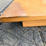 Solid wood dining table. Damage on corner as shown in photos. Image 2