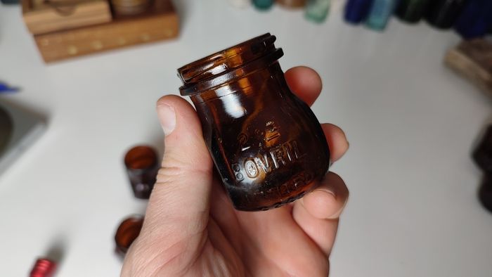 143 - Set of 4 Vintage 2oz Bovril Dark Brown Glass Embossed Letters Collectible Decorative Jars