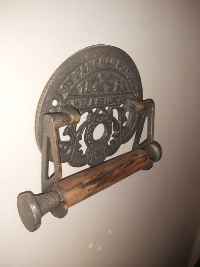 Cast iron toilet holder