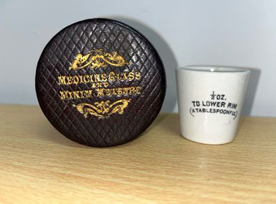 antique doctors measuring glass and case