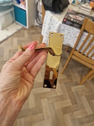 2 sets of brass door handles
