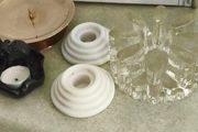 4 Candle holders Items Brass 5 1/2in Candle Holder Solid Brass Decent Condition 22.00 euro, vintage Bel Mondo glass pot warmer or candle holder designed with a textured, ice finish 25.00 euro. set of 2 white marble candle holder 22.00 E. Thai tea light ho