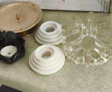 4 Candle holders Items Brass 5 1/2in Candle Holder Solid Brass Decent Condition 22.00 euro, vintage Bel Mondo glass pot warmer or candle holder designed with a textured, ice finish 25.00 euro. set of 2 white marble candle holder 22.00 E. Thai tea light ho