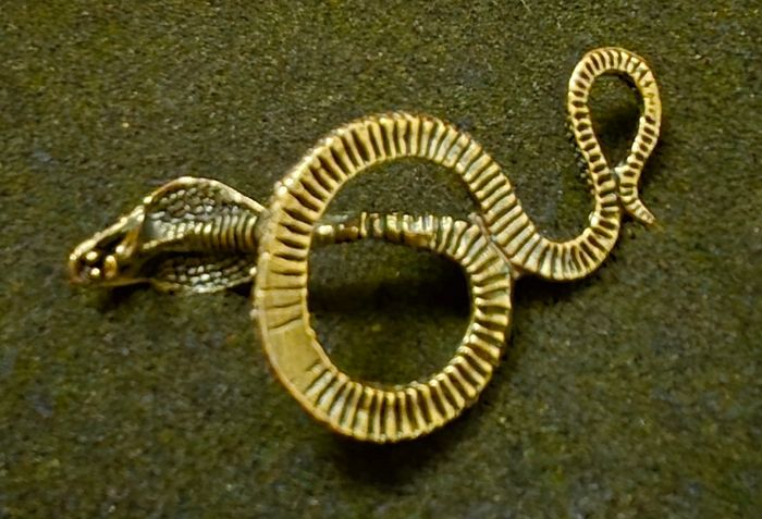3 brass snakes.