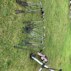 golf trolley and 2 sets of clubs