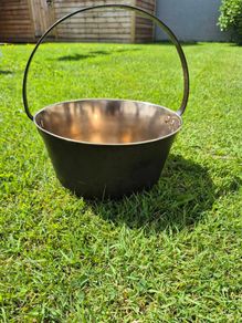 19th-century antique solid brass preserving pan with a hand-forged iron swing handle.