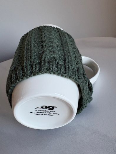Cosy coffee mug with woolly jumper