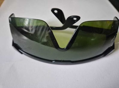 Green safety glasses for laser