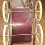 Antique Burgundy Doll's Pram, Manufactured by Walker around the 1940s, It features a Coach-Built Style Carriage with distinctive Wire-Spoke Wheels and Hard Rubber Tires Collection Only Image 10