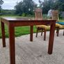 solid teak table and chairs Image 2