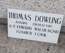 advertising builders sign cork ,hard plastic on plaster board, buyer collects or pays postage thank you