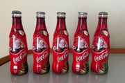 5 Vintage Christmas Coca Cola bottles