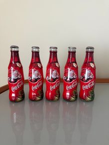 5 Vintage Christmas Coca Cola bottles
