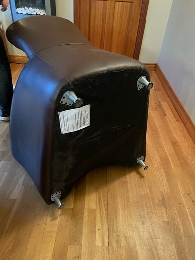 Real leather brown arm chair with foot stool