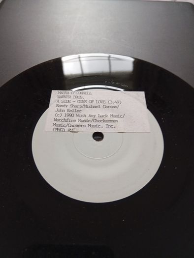 Guns of love/ Broken bicycles 7" vinyl test pressing maura o connell