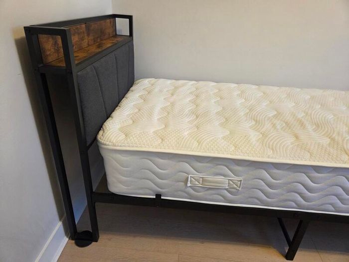 Single bed with mattress and topper