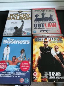 4 DVD's including - hot fuzz, rocky balboa, outlaw and the business