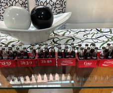 Vintage 1980s Coca-Cola Mini Bottle Collection with Original Crates