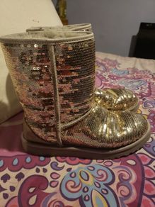 Beautiful gold genuine UGG boots would fit 5.5 to 7.5