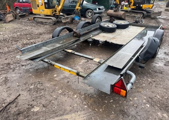 bryan james car carrying trailer Brian