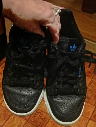beautiful black leather Adidas runners