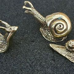 3 brass snails.