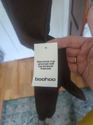 Boohoo jumpsuit Dark chocolate brown jumpsuit with gathered waist. Slight stretch in material.  Says sz 12 but small fitting.