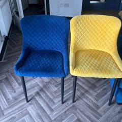 4 velvet dining chairs - 2 blue and 2 yellow