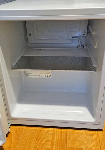 Compact white mini fridge