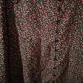 Missguided dress features a ditsy floral print on a black background with button detailing. New with Tags. Image 4